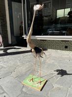 Kunstzinnige loopvogel, flamingo art van drijfhout, Ophalen