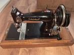 antieke hand naaimachine, Ophalen