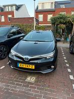 Toyota Auris Touring Sports 1.8 Hybrid Trend Automaat (2017), Auto's, 65 €/maand, Zwart, Blauw, Origineel Nederlands
