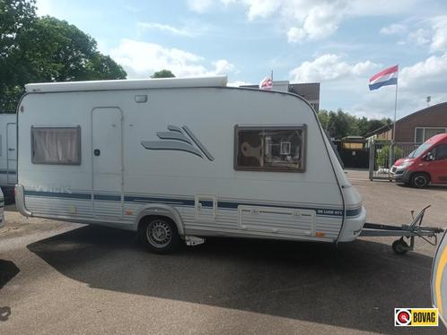 Wilk De Luxe 471 DQ, Caravans en Kamperen, Caravans, Bedrijf, tot en met 4, 1000 - 1250 kg, Rondzit, Wilk, Dwarsbed, Overige typen