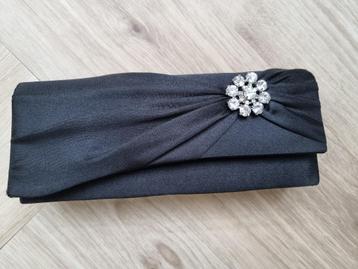 Zwarte clutch met strassteentjes beschikbaar voor biedingen