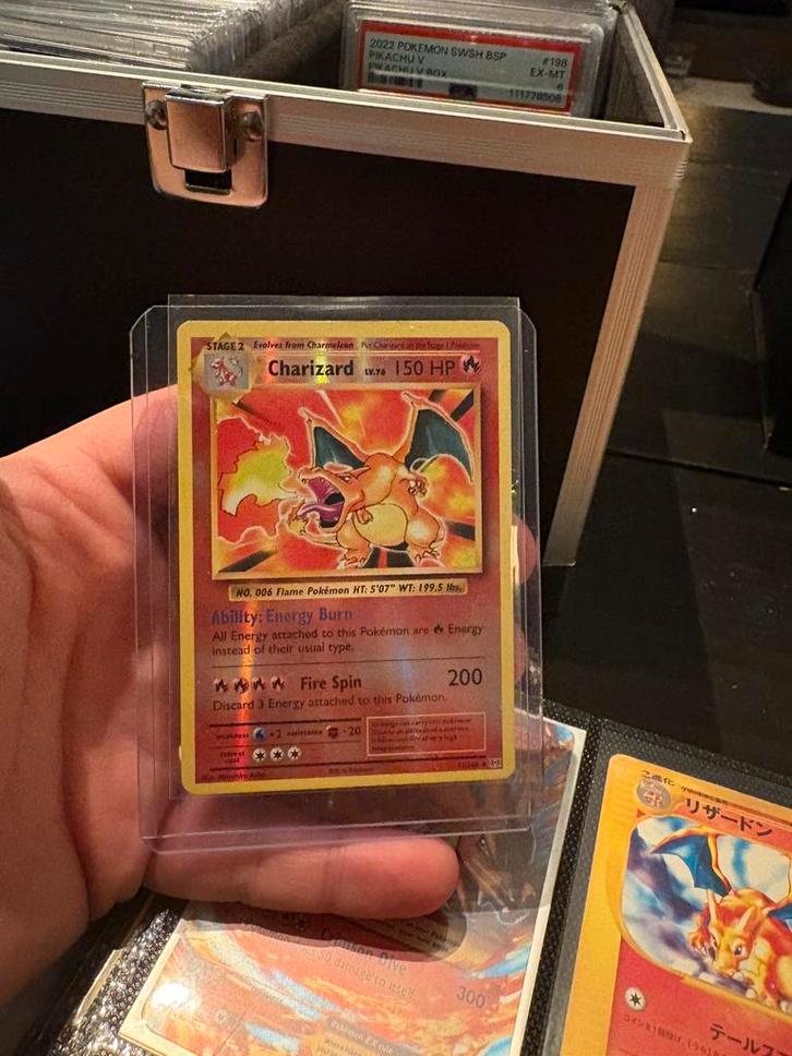 Charizard reverse holo evolutions, Hobby en Vrije tijd, Verzamelkaartspellen | Pokémon, Zo goed als nieuw, Meerdere kaarten, Foil