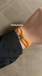 Cartier Trinity oranje, Sieraden, Tassen en Uiterlijk, Armbanden, Ophalen of Verzenden, Nieuw, Goud, Met bedels of kralen