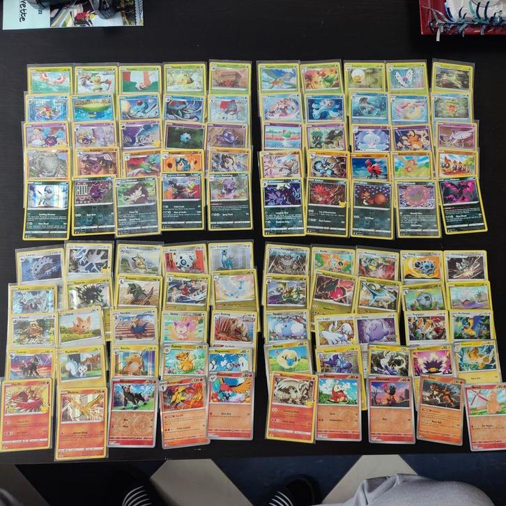 100 Verschillende Glimmende Pokémon, Hobby en Vrije tijd, Verzamelkaartspellen | Pokémon, Nieuw, Meerdere kaarten, Foil, Ophalen of Verzenden