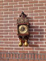 Antieke zaanse klok, Ophalen