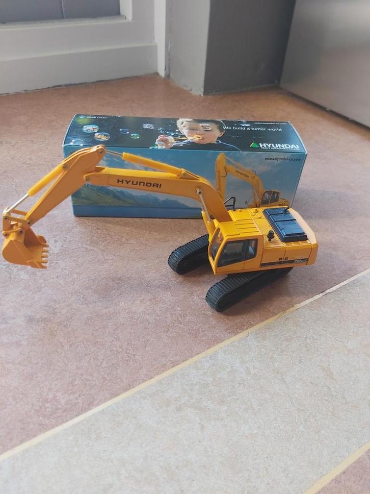 Hyundai ROBEX R290LC-7 hydr. rupsgraafmachine 1/50 in OVP, Hobby en Vrije tijd, Modelauto's | 1:50, Nieuw, Hijskraan, Tractor of Landbouw