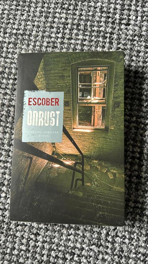 Escober - Onrust, Boeken, Thrillers, Zo goed als nieuw, Ophalen of Verzenden