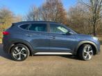 Hyundai TUCSON 1.6 T-GDi Premium 4WD | Pano | Trekhaak | Key, Auto's, Hyundai, Gebruikt, 4 cilinders, Met garantie (alle), Blauw