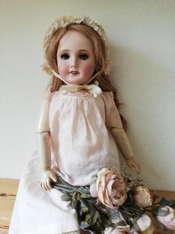 Antieke pop 56 cm. beschikbaar voor biedingen