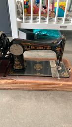 Antieke Gritzer naaimachine met houten kist en sleutel, Antiek en Kunst, Antiek | Naaimachines, Ophalen of Verzenden