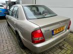 Mazda 323 1.6i Touring AUTOMAAT/AIRCO/NAVI, Auto's, Mazda, 47 €/maand, Origineel Nederlands, Te koop, Zilver of Grijs