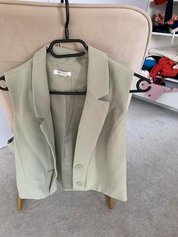 Bodywarmer + broek S beschikbaar voor biedingen