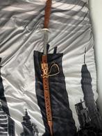 Decoratief zwaard met houten schede, Ophalen