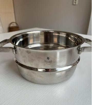 Stoominzet RVS voor in pan. 21,4 bij 10,8 cm. Als nieuw beschikbaar voor biedingen