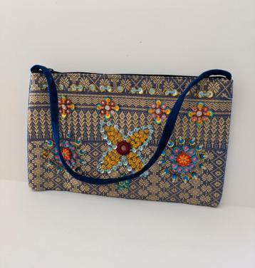 Etui tasje
met prachtige glitters beschikbaar voor biedingen