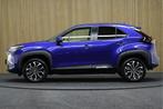 Toyota Yaris Cross 1.5 Hybrid 115 First Edition | Adaptive-c, Stof, Gebruikt, Blauw, Bedrijf