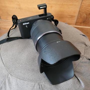 Nikon 1 j1 met 10-100mm en tas en lader kaart en accu beschikbaar voor biedingen