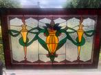 Glas in lood raamhanger, Ophalen