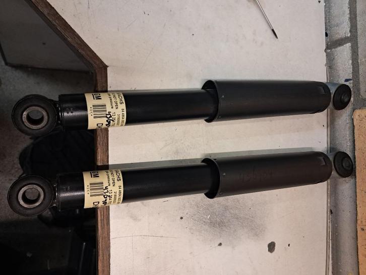 schokdemper (achterzijde) 844904003499 zowel L+R, Auto-onderdelen, Ophanging en Onderstel, Opel, Nieuw, Ophalen