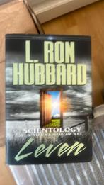 L. Ron Hubbard - Scientology een nieuwe kijk op het leven, Achtergrond en Informatie, Ophalen of Verzenden, Zo goed als nieuw