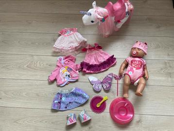 Baby Born pop + unicorn + 3 kleding sets  beschikbaar voor biedingen