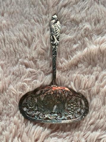 Antieke kroket lepel beschikbaar voor biedingen