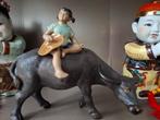Chinees meisje op waterbuffel beeldje, Ophalen