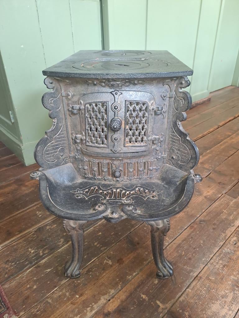 Franse antiek gietijzeren hout en kolen kachel, Ophalen