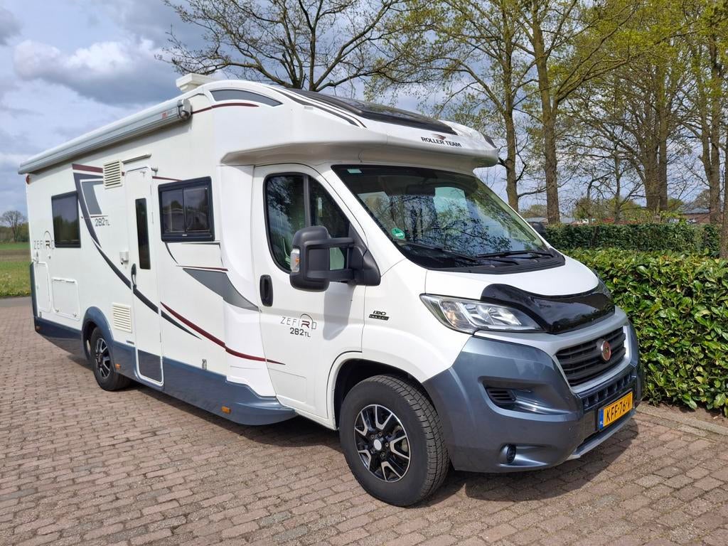 RollerTeam 2016 Enkele Lage bedden -liftbed 56000 km airco, Ringverwarming, Fiat, Airbags, Afzuigkap