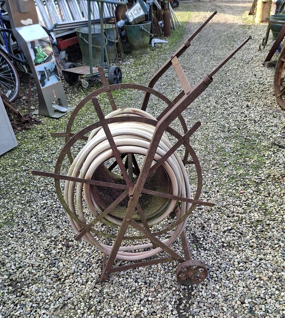 Vintage Slangenhaspel, Ophalen