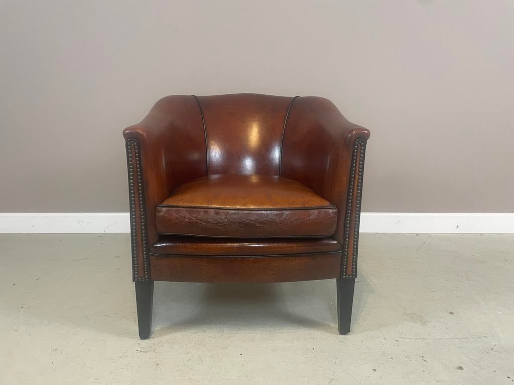 Schapenleren clubfauteuil “Celeste” van Lounge Atelier, Ophalen, Gebruikt, Leer