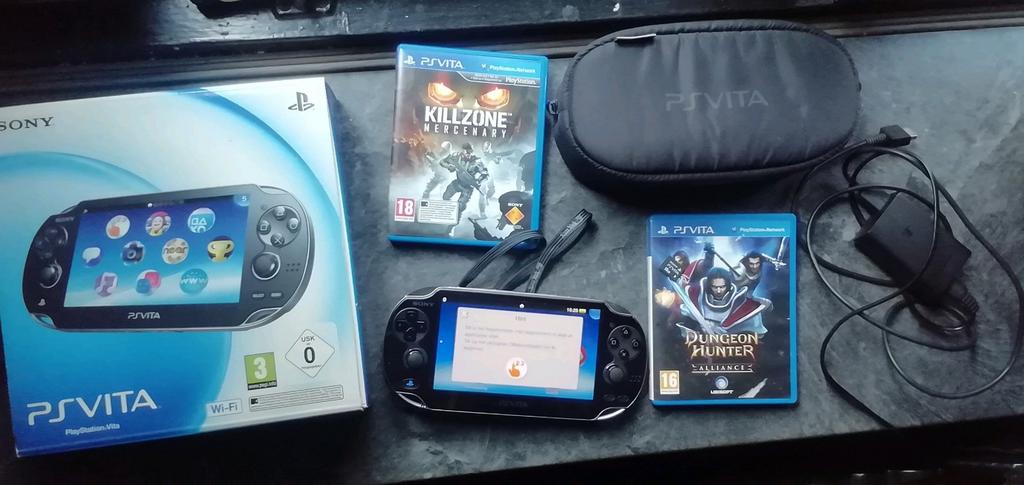 Playstation vita met doos lader games en originele 16 gb mc., Met games, Overige modellen, Zwart, Ophalen of Verzenden