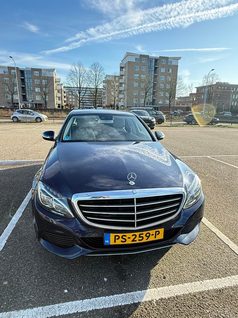 Mercedes-Benz C-Klasse C180 1.6 115KW Aut7 2015 Blauw, Automaat, 1800 kg, Blauw, 1595 cc