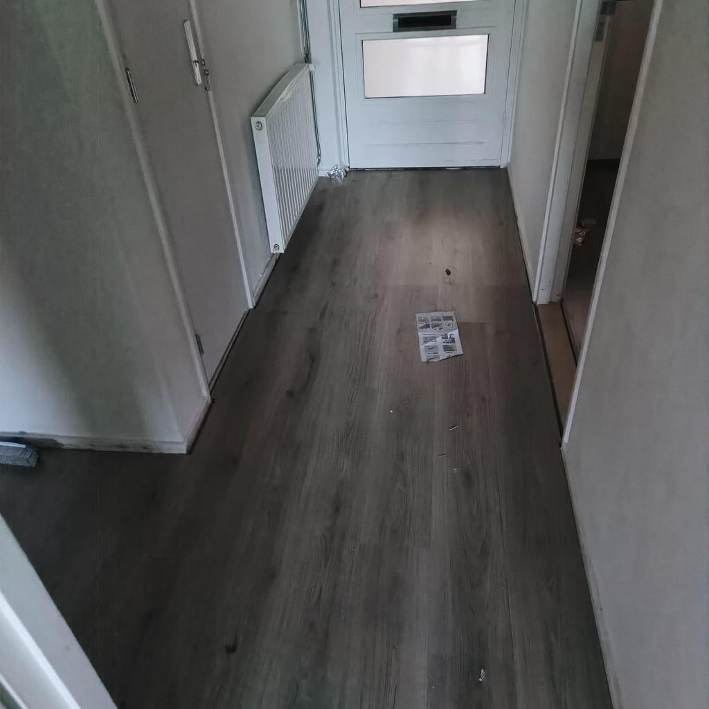 Laminaat leggen PVC visgraat vloer, Nieuw, Ophalen of Verzenden, Grijs, Visgraat