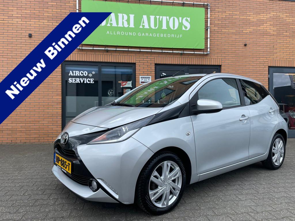 Toyota Aygo 1.0 VVT-i x-wave Open dak (bj 2015), Auto's, Voorwielaandrijving, Stof, Gebruikt, 4 stoelen