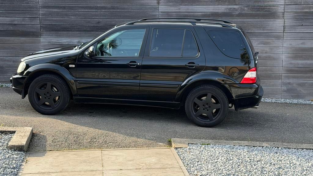 Mercedes ML55 AMG, Auto's, Mercedes-Benz, Automaat, 2202 kg, 8 cilinders, 347 pk