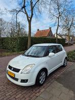 Suzuki Swift 1.3 5drs APK Airco Keyless Navigatie, Auto's, Suzuki, Stof, Stoelverwarming, Handgeschakeld, Grijs