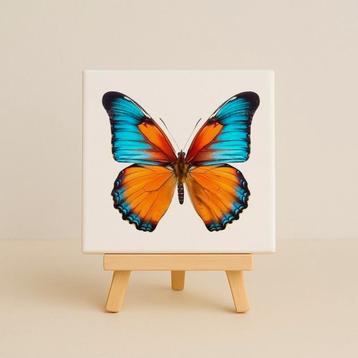 Wandtegeltje Vlinder blauw / oranje beschikbaar voor biedingen