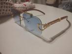 Zonnebril Cartier, Ophalen of Verzenden, Nieuw, Blauw, Zonnebril