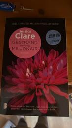Jessica Clare - gestrand met een miljonair, Ophalen of Verzenden, Zo goed als nieuw, Nederland