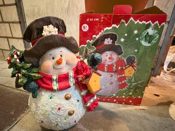 Sneeuwpop met lichtjes en geluid beschikbaar voor biedingen