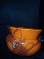 Oranje hangende vaas met decoratie, Ophalen
