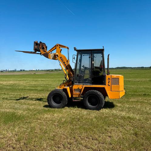 Ahlmann AZ4 shovel roterend incl puinriek en trekhaak, Zakelijke goederen, Machines en Bouw | Kranen en Graafmachines, Wiellader of Shovel