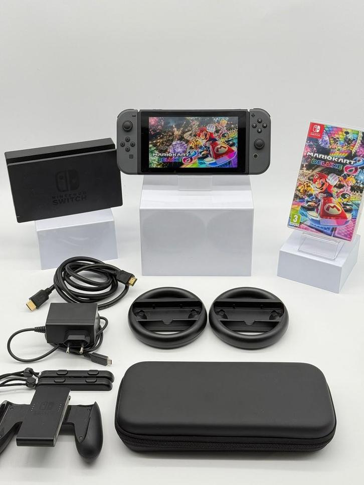 NINTENDO SWITCH NIEUW MODEL 2023 V2 MARIO KART+STUURTJES, Spelcomputers en Games, Spelcomputers | Nintendo Switch, Zo goed als nieuw
