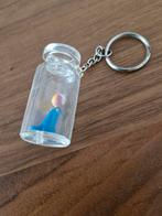 647 Sleutelhanger met zeehond in flesje, Ophalen of Verzenden, Zo goed als nieuw