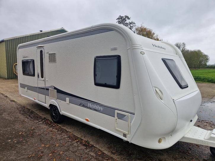 Hobby 560 CFE de Luxe, Voortent 2,70 meter diep 15950,- !!, Caravans en Kamperen, Caravans, Bedrijf, tot en met 4, 1250 - 1500 kg