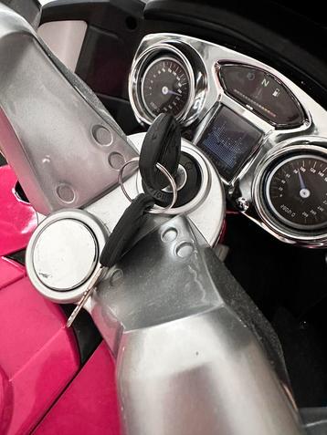 Elektronische Kindermotor - Roze Politie beschikbaar voor biedingen