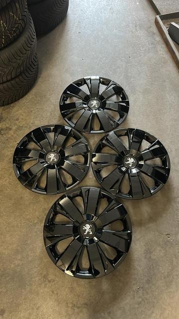 set zwarte peugeot wieldoppen 15 inch beschikbaar voor biedingen