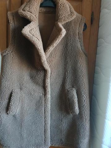 Prachtige teddy bruine/camel bodywarmer in maat 38. beschikbaar voor biedingen
