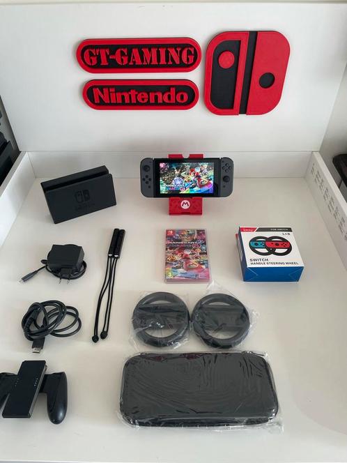 NINTENDO SWITCH NIEUW MODEL 2023 V2 MARIO KART+STUURTJES, Spelcomputers en Games, Spelcomputers | Nintendo Switch, Zo goed als nieuw